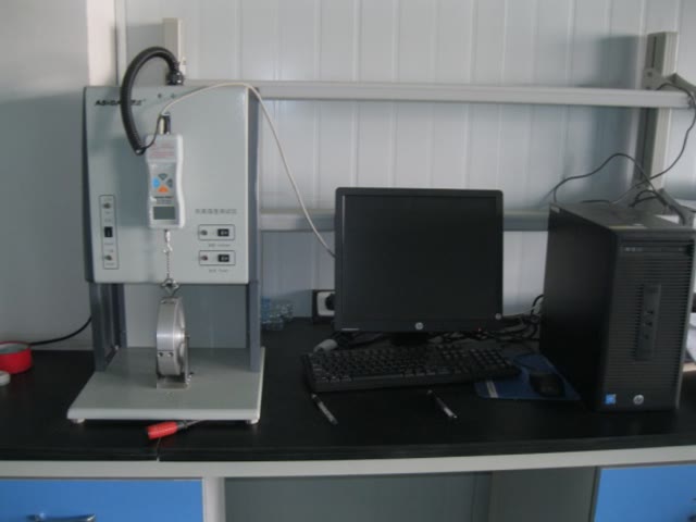 Tensile and peel testing machine